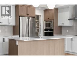 Family room - 116 Quartz Crescent, Cochrane, AB T4C3G2 Photo 11
