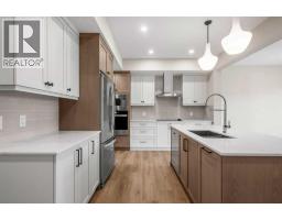Laundry room - 116 Quartz Crescent, Cochrane, AB T4C3G2 Photo 12