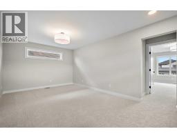 116 Quartz Crescent, Cochrane, AB T4C3G2 Photo 19