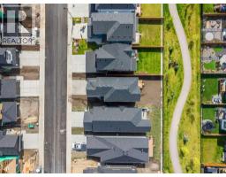116 Quartz Crescent, Cochrane, AB T4C3G2 Photo 40