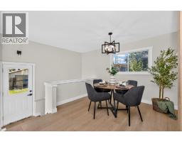 Living room - 140 Fyffe Road Se, Calgary, AB T2H1C1 Photo 8