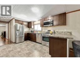 Primary Bedroom - 105, 6724 17 Avenue Se, Calgary, AB T2A0W5 Photo 6