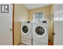 Laundry room - 332 Harvest Hills Drive Ne, Calgary, AB T3K4H7 Photo 13