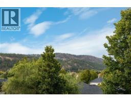 Primary Bedroom - 307 Whitman Road Unit# 406, Kelowna, BC V1V2P3 Photo 6