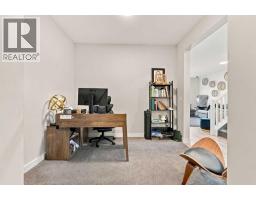 Family room - 10 Belmont  Sw, Calgary, AB T2X4H7 Photo 11