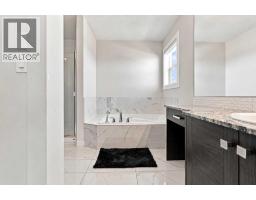 10 Belmont  Sw, Calgary, AB T2X4H7 Photo 19