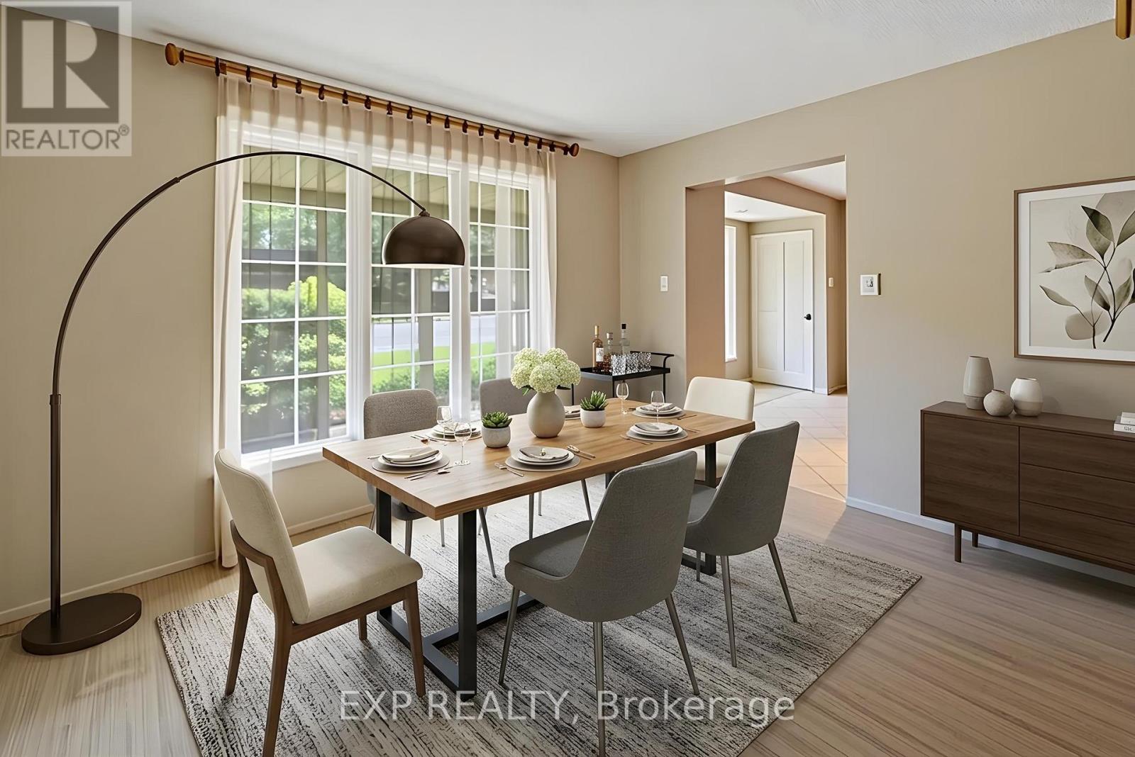 Formal dining room with floor to ceiling windows