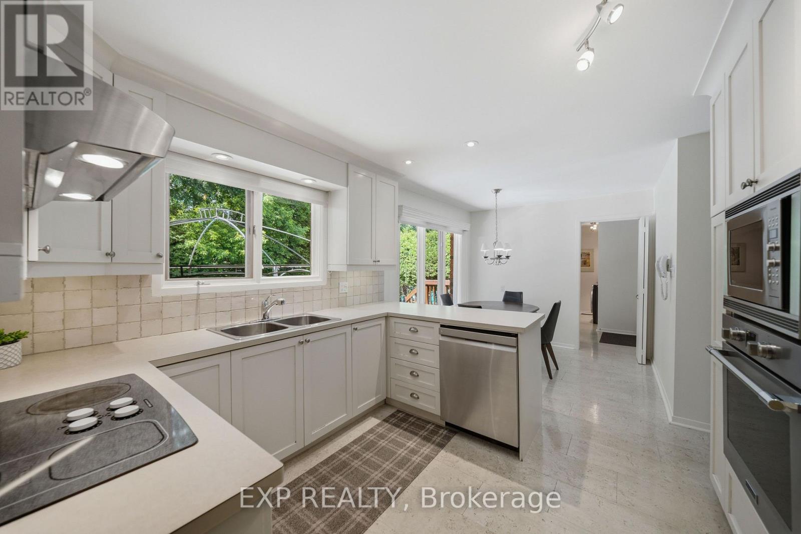 Modern kitchen with stainless steel appliances
