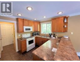 Primary bedroom of 9122 REYNOLDS ROAD · Prince George, BC