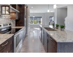 Living room - 172 Sundown Road, Cochrane, AB T4C2M5 Photo 6