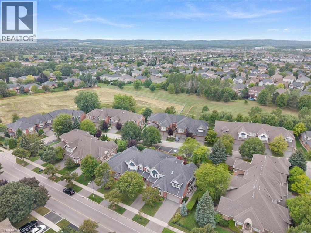 Residential neighborhood with mature trees and green spaces