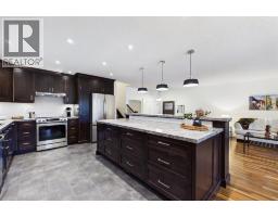 Laundry room - 43 Beaconsfield Rise Nw, Calgary, AB T3K1X3 Photo 10