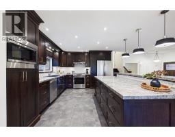 Family room - 43 Beaconsfield Rise Nw, Calgary, AB T3K1X3 Photo 9