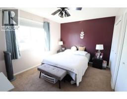 Family room - 4930 58 Avenue, Taber, AB T1G1E7 Photo 7