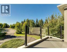 211 Aspen Green, Rural Rocky View County, AB T3Z3C1 Photo 30