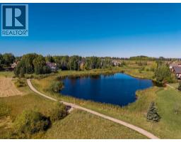 211 Aspen Green, Rural Rocky View County, AB T3Z3C1 Photo 50