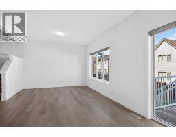 Living room/Dining room - 48 Willow Green Sw, Airdrie, AB T4B5M3 Photo 14