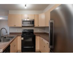 Laundry room - #214 4309 33 St, Stony Plain, AB T7Z0C4 Photo 6