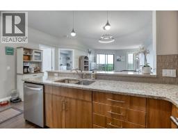 2203, 15 Sunset Square, Cochrane, AB T4C0E7 Photo 8