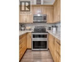 Primary Bedroom - 2203, 15 Sunset Square, Cochrane, AB T4C0E7 Photo 7