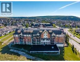 2203, 15 Sunset Square, Cochrane, AB T4C0E7 Photo 36