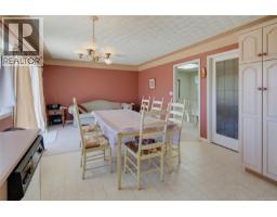Living room - 1847 El Sereno Dr, Saanich, BC V8N6K4 Photo 13