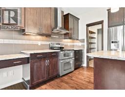 Laundry room - 38 Drake Landing Drive, Okotoks, AB T1S0B9 Photo 11