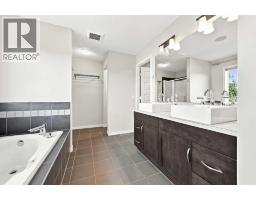 38 Drake Landing Drive, Okotoks, AB T1S0B9 Photo 17