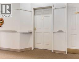 Laundry room - 101, 305 1 Avenue Nw, Airdrie, AB T4B2M5 Photo 6