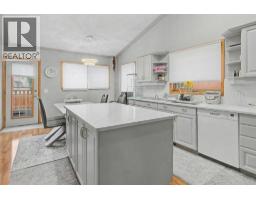 Laundry room - 7212 California Boulevard Ne, Calgary, AB T1Y6X5 Photo 9