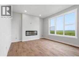 Bonus Room - 446 Kinniburgh Loop, Chestermere, AB T1X3C4 Photo 10