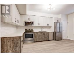 101 - 120 Garrison Village Drive, Niagara On The Lake, ON L0S1J0 Photo 12