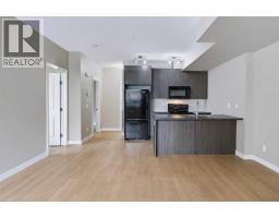 210, 300 Marina Drive, Chestermere, AB T1X0P6 Photo 10