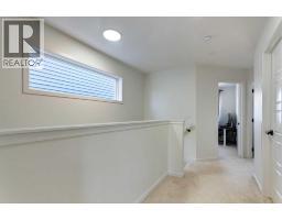 30 Creekside Manor Sw, Calgary, AB T2X5S2 Photo 14