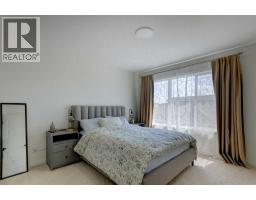 30 Creekside Manor Sw, Calgary, AB T2X5S2 Photo 15