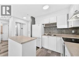 Primary Bedroom - 109, 1717 60 Street Se, Calgary, AB T2A7Y7 Photo 6