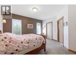 Bedroom - 26139 Highway 595, Rural Red Deer County, AB T4E0T9 Photo 11