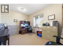 Family room - 26139 Highway 595, Rural Red Deer County, AB T4E0T9 Photo 14