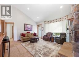 Living room - 26139 Highway 595, Rural Red Deer County, AB T4E0T9 Photo 9