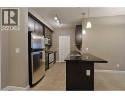 Bedroom - 421, 88 Arbour Lake Road Nw, Calgary, AB T3G0C2 Photo 9