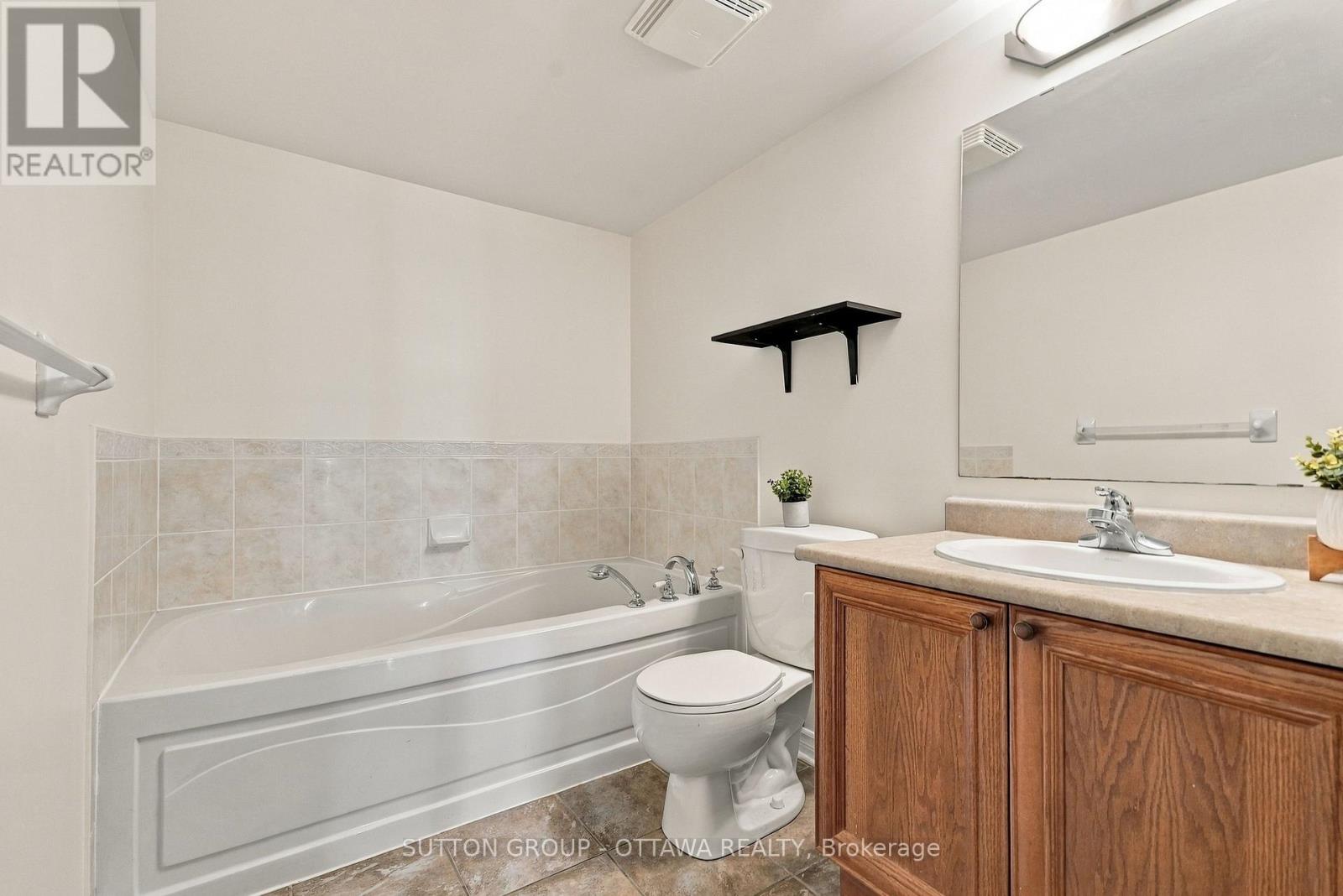#802 120 GRANT CARMAN DRIVE - 34