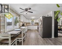Family room - 10 & 20, 30245 Range Road 12, Rural Mountain View County, AB T0M0N0 Photo 9