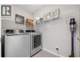 Bedroom - 17 Fireside Cove, Cochrane, AB T4C0X3 Photo 13