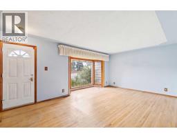 Living room - 4528 26 Avenue Sw, Calgary, AB T3E0P9 Photo 6