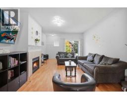 Living room - 47 Bridlewood View Sw, Calgary, AB T2Y3X7 Photo 7
