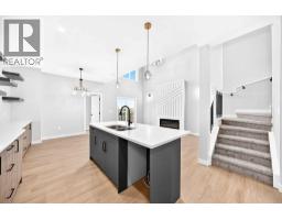 Living room - 1915 Mccaskill Drive, Crossfield, AB T0M0S0 Photo 7