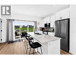 673 Anderson Close Nw, Diamond Valley, AB T0L2A0 Photo 12