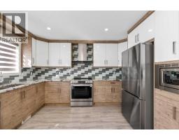 Kitchen - 23 Anaheim Circle Ne, Calgary, AB T1Y7E2 Photo 16
