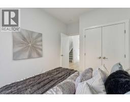 Bedroom - 105, 95 Saddlecrest Circle Ne, Calgary, AB T3J0Z2 Photo 10