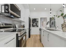 Primary Bedroom - 105, 95 Saddlecrest Circle Ne, Calgary, AB T3J0Z2 Photo 8
